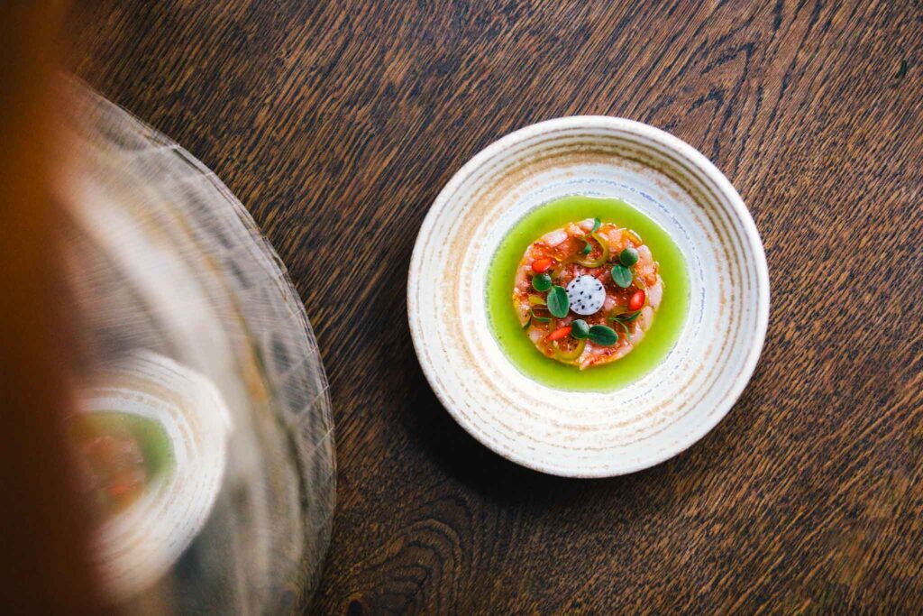Carabinero shrimp dish at até, Amsterdam's smallest chef's table restaurant by Chef Filip Hanlo in luxury boutique hotel The Dylan Amsterdam